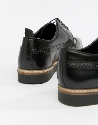 ASOS DESIGN brogue shoes in black leather with wedge sole