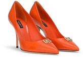 Thumbnail for your product : Dolce & Gabbana plaque point-toe pumps