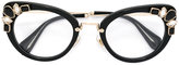 Miu Miu Eyewear - lunettes oeil de ch 