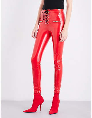 Unravel Lace-up skinny latex trousers