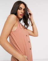 Thumbnail for your product : ASOS DESIGN tie shoulder crinkle button front jumpsuit in rust