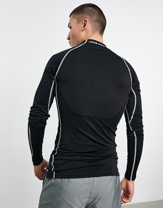 Nike Training Nike Pro Training Dri-FIT mock neck slim long sleeve top in  black - ShopStyle