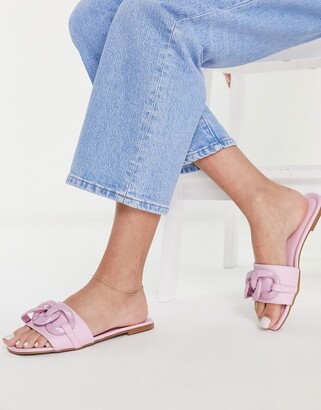 ASOS DESIGN Wide Fit Fife flat mules with chain in pink