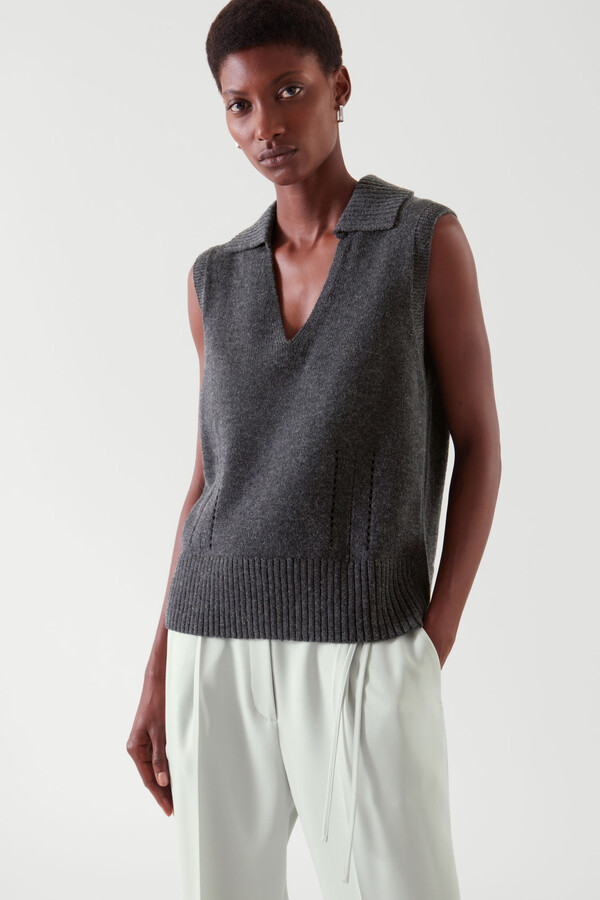 grey sweater with white collar