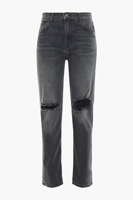 The Stovepipe distressed high-rise slim-leg jeans