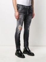 Thumbnail for your product : DSQUARED2 Skater ripped skinny jeans