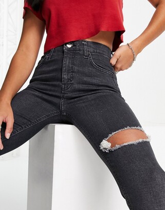 Topshop Petite Jamie jeans with thigh rip in washed black - ShopStyle