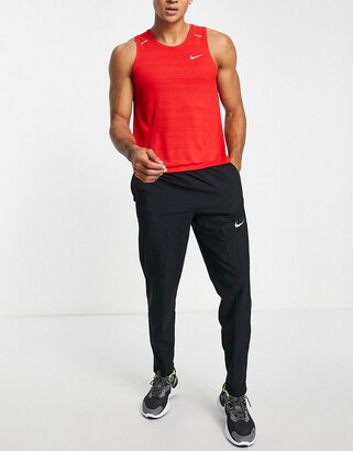 Nike Running Dri-FIT Miler tank in red - ShopStyle Activewear Shirts