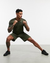 Thumbnail for your product : Nike Training flex shorts with camo logo in khaki