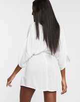 Thumbnail for your product : Asos Tall ASOS DESIGN TALL crinkle beach cover up with channel waist & drape sleeves in white