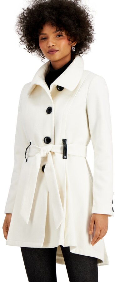 white skirted coat