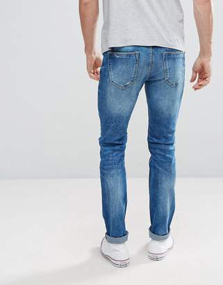 Celio Slim Fit Jeans In Mid Wash Blue With Distressing