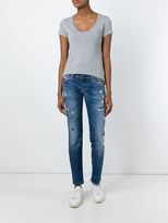 Thumbnail for your product : Diesel tapered distressed jeans - women - Cotton/Spandex/Elastane - 30/32