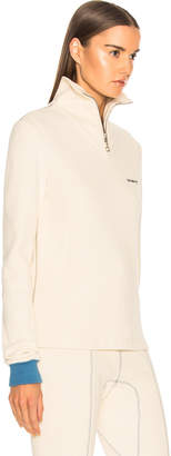 Calvin Klein Turtleneck Zip Sweater in Ecru | FWRD