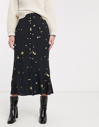 Only midi skirt with button through in black ditsy floral