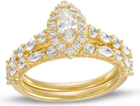 Zales Previously Owned - 1-1/2 CT. T.w. Marquise Diamond Frame Alternating Shank Bridal Set in 14K Gold (I/I1)