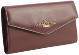 Thumbnail for your product : Valentino wine leather logo stamp continental wallet