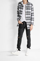 Thumbnail for your product : Off-White Waxed Distressed Jeans