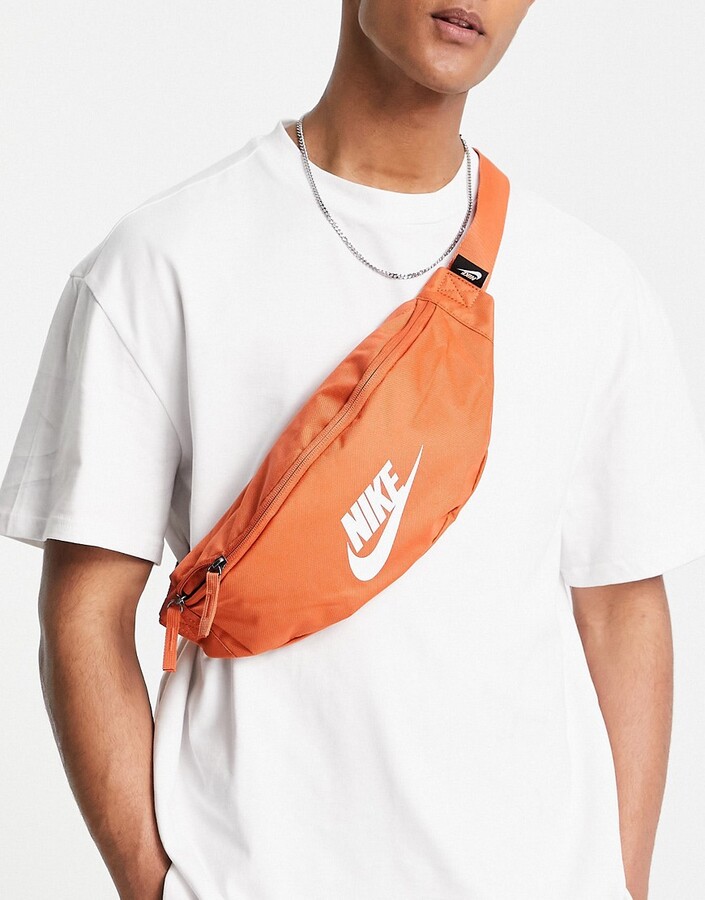 Nike Heritage fanny pack in dusty orange - ShopStyle Backpacks