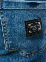 Thumbnail for your product : Philipp Plein distressed high low raw hem skinny jeans