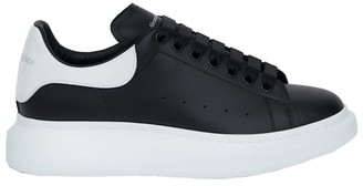 black with white sole trainers