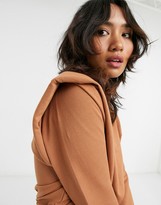 Thumbnail for your product : ASOS Petite DESIGN petite long sleeve shoulder pad jogger jumpsuit in rust