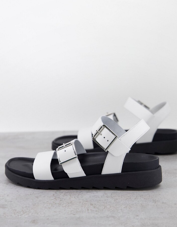 schuh chaser leather chunky buckle sandals in black