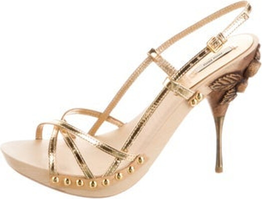 Miu Miu Leather Slingback Sandals Gold Crystal Embellishments Platform Crossover Straps & Buckle Closure at Ankles Includes Dust Bag Unfortunately, due to restrictions, this item may not be eligible for shipping in all areas.