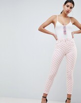 Thumbnail for your product : ASOS DESIGN high rise ridley 'skinny' jeans in pink mono print