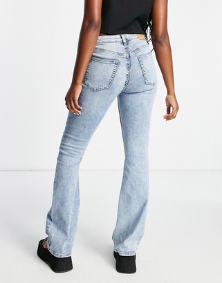 Weekday Flame low rise seam detail flared jeans in bleach light blue -  ShopStyle