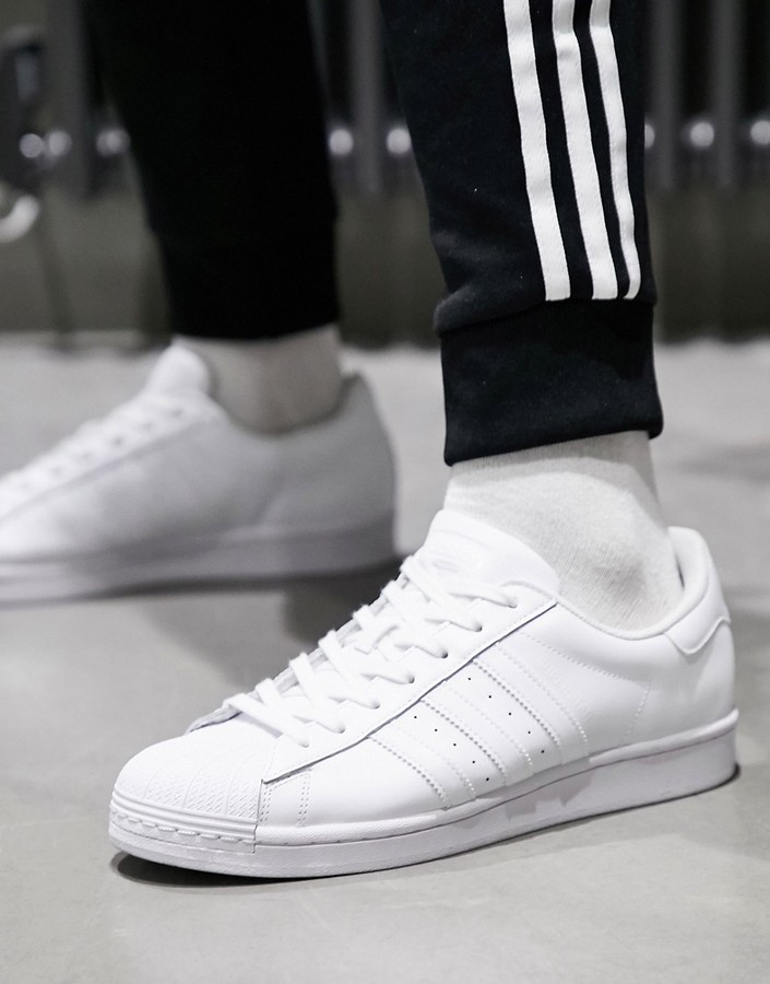 adidas Superstar trainers in triple white -