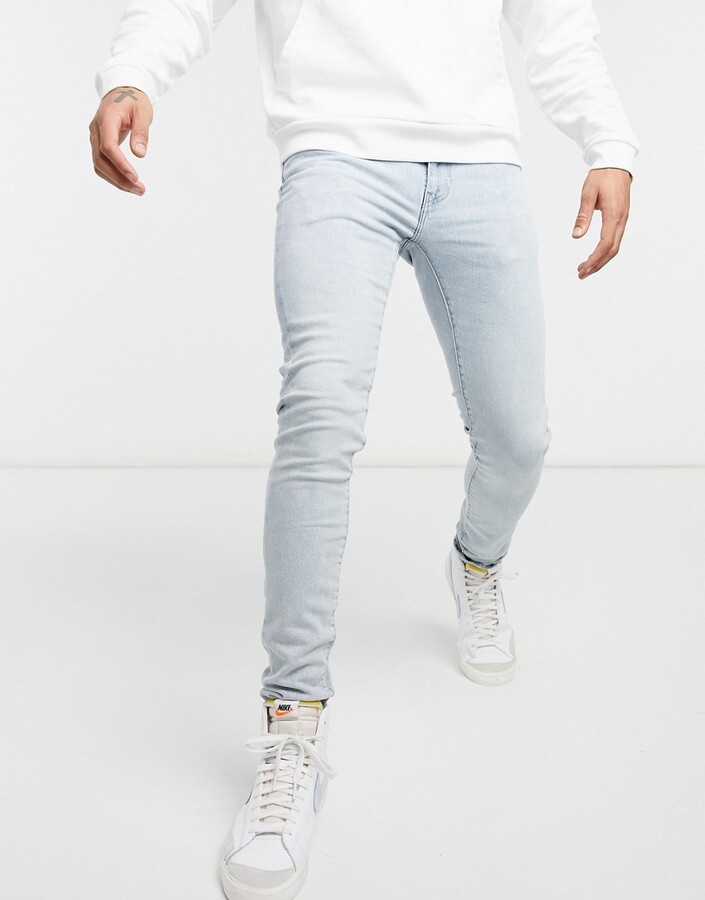 Levi's skinny tapered fit jeans in eat the popcorn advanced light wash -  ShopStyle