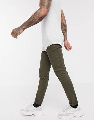 dark green skinny chinos