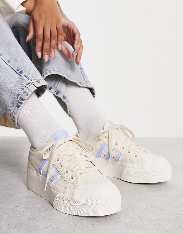 adidas Nizza Platform low sneakers in cream and light blue - ShopStyle