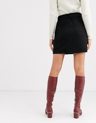 Vero Moda Tall belted mini skirt in black faux suede