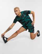 Thumbnail for your product : New Balance Running Accelerate t-shirt in green camo print