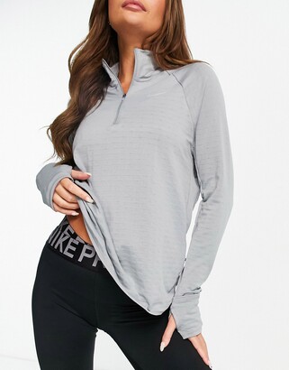Nike Running Element Therma-FIT half zip top in grey - ShopStyle
