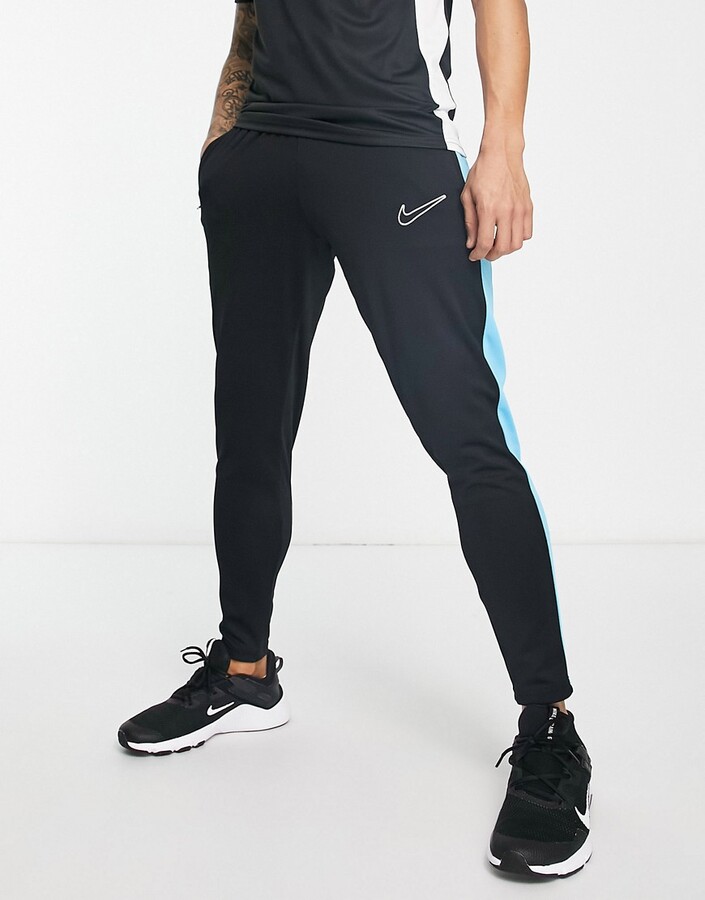 Nike Football Academy DriFIT panelled joggers in black blue and indigo