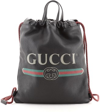 gucci print leather drawstring backpack