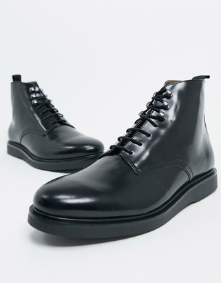 H By Hudson battle boots in black high shine leather