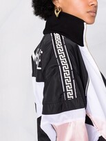 Thumbnail for your product : Versace Greca logo-trim lightweight jacket