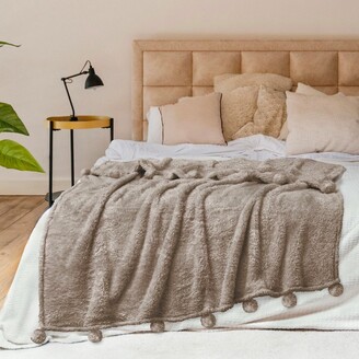 https://img.shopstyle-cdn.com/sim/c8/bf/c8bfb9913f9d8df306bbeb680a4ae32a_xlarge/pavilia-fluffy-throw-blanket-with-pompom-lightweight-soft-plush-cozy-warm-pom-pom-fringe-for-couch-sofa-bed-dusty-blue-throw-50x60.jpg