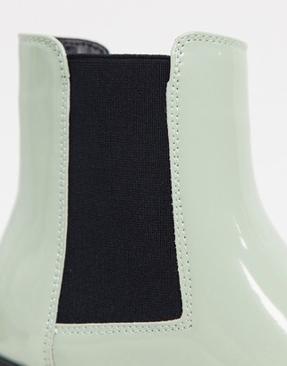 ASOS DESIGN cuban heel western chelsea boot in pastel green patent faux leather with square toe with metal cap