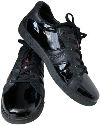 black patent leather trainers