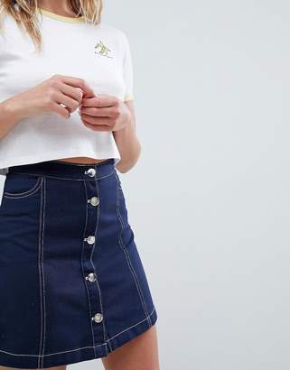 Monki A-line denim skirt with organic cotton and button detail in indigo