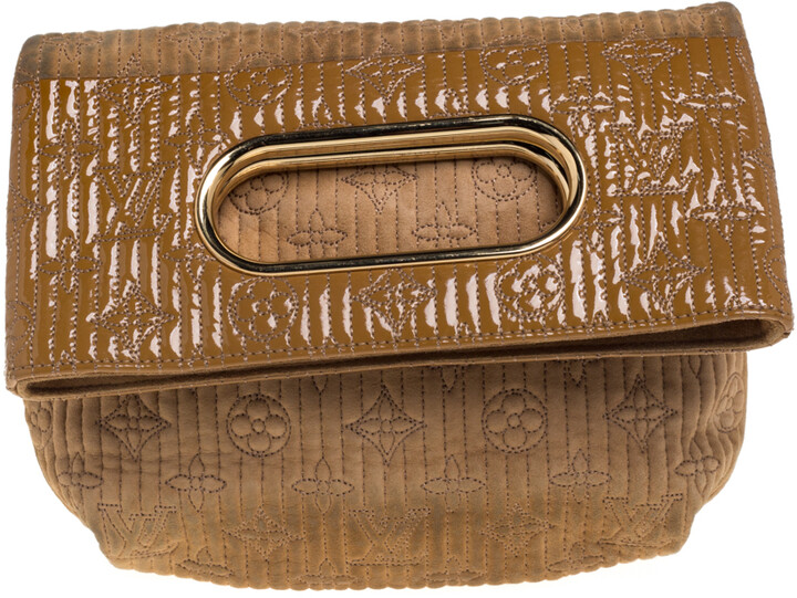 beige patent leather clutch