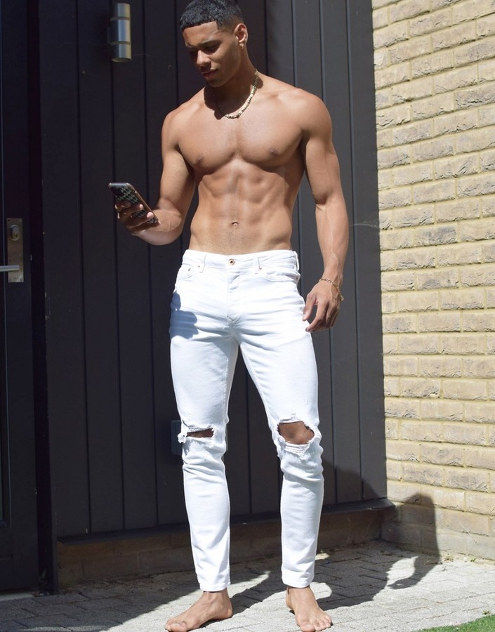 white jeans with rips