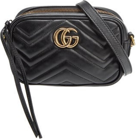 Gucci Crossbody Bag Black Leather Double G Logo & Chevron Gold-Tone Hardware Chain-Link Accents & Single Exterior Pocket Suede Lining & Single Interior Pocket Zip Closure at Top Includes Dust Bag Unfortunately, due to restrictions, this item may not be eligible for shipping in all areas.