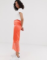 Thumbnail for your product : ASOS DESIGN bias cut satin midi slip skirt with lace hem in neon orange