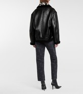 Thumbnail for your product : Balenciaga Logo shearling and leather jacket